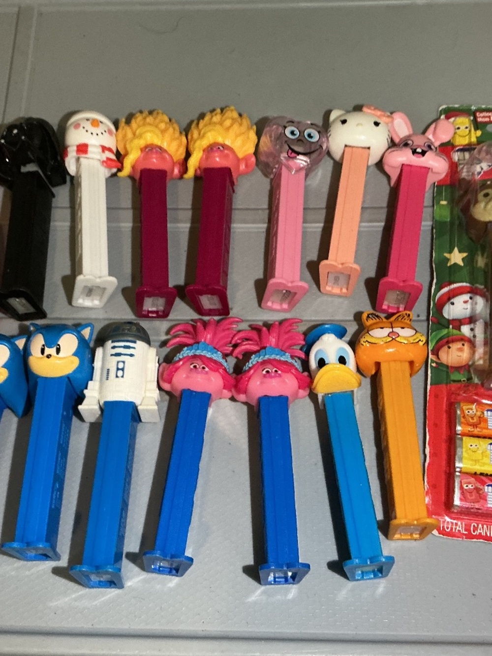 17 Pez Dispensers With Sonic Star Wars trolls hello kitty Garfield and more